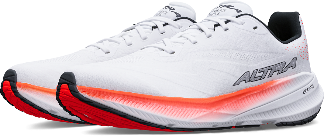 A pair of white Altra Experience Flow 3 running shoes with red and black accents on a white background