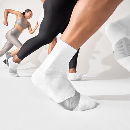 People running in Feetures socks