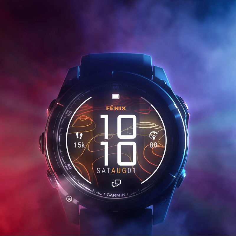 Garmin fenix 8 Pro GPS watch on a dark red and blue gradient background 