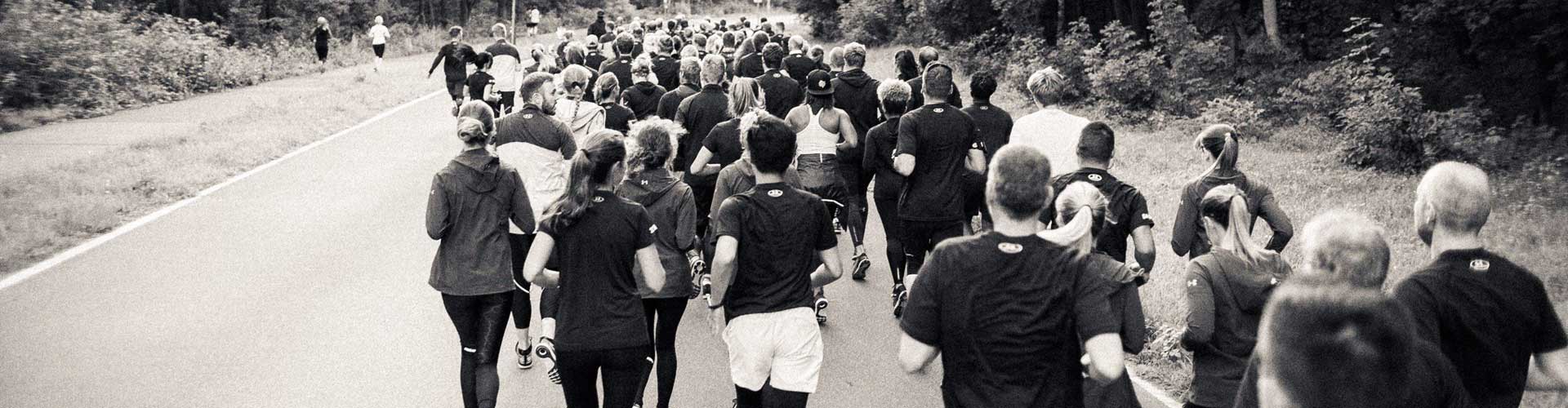 people running in black and white filter