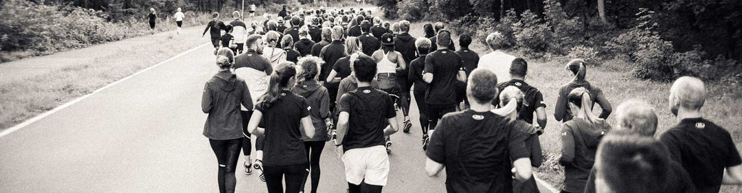people running in black and white filter