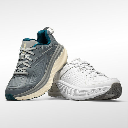 Dark grey and white hoka shoes