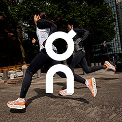 On logo layered over a lifestyle image of a woman and a man running past green trees and a glass building in On running shoes and clothing.