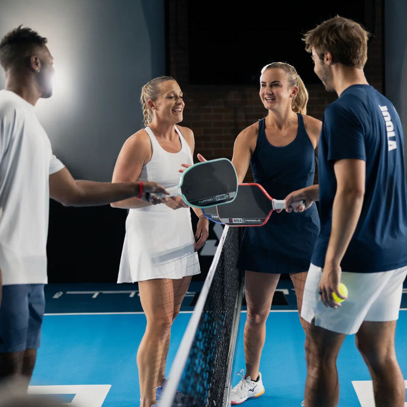 people playing pickleball with JOOLA Pro V paddles