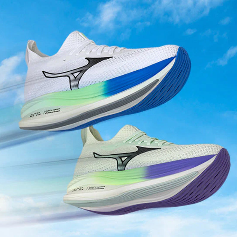 Two Mizuno Neo Zen running shoes with a blue and green midsoles against a sky background