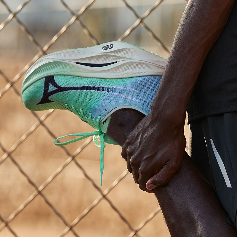 Person wearing Mizuno Wave Rebellion Pro 3 Unisex running shoes