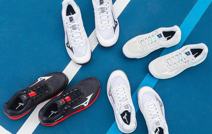 Black and white mizuno top shoes