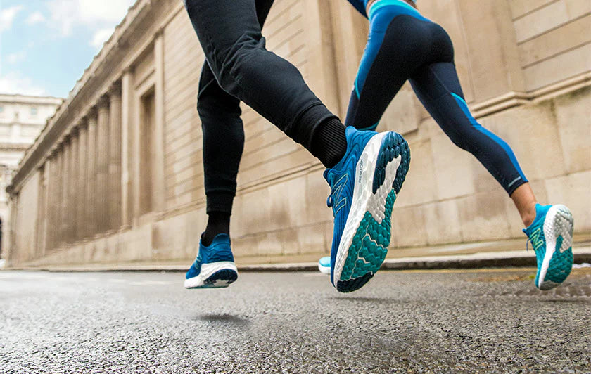 Women with blue new balance shoes