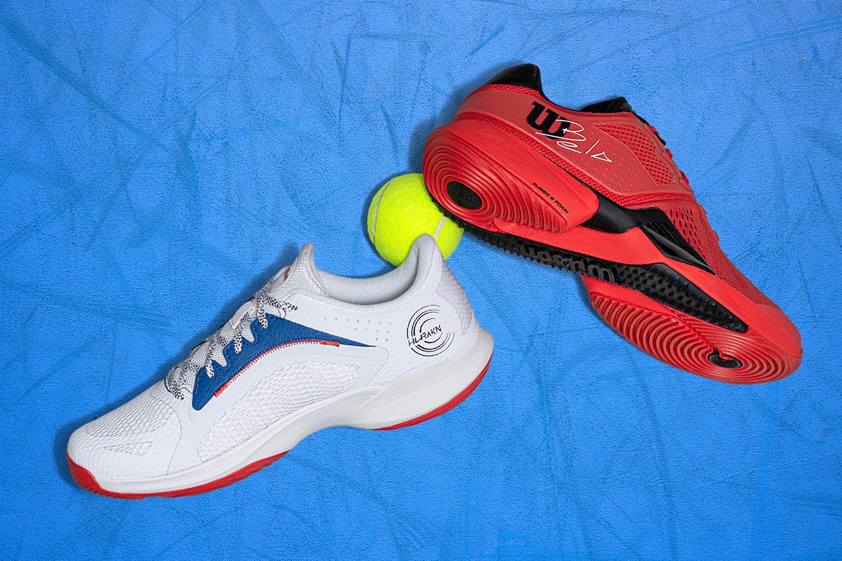 Wilson padel shoes on a blue court