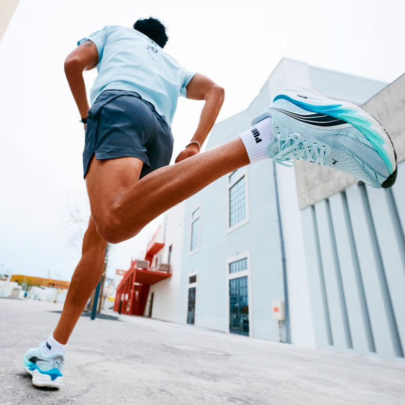Image of a person running in PUMA Velocity Nitro 4 running shoes
