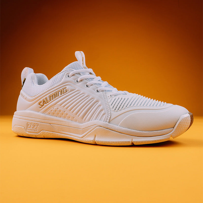 White Salming Eagle 2 Squash shoes against an orage backdrop