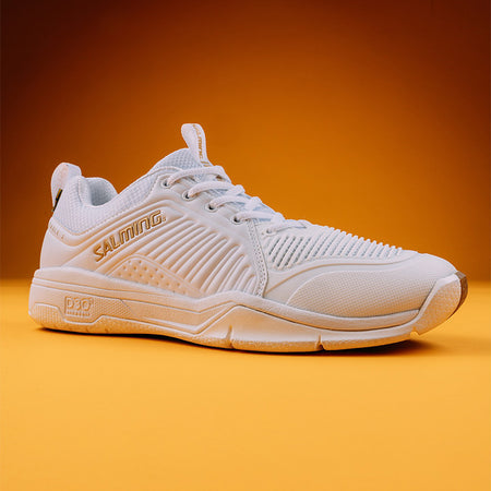 White Salming Eagle 2 Squash shoes against an orage backdrop