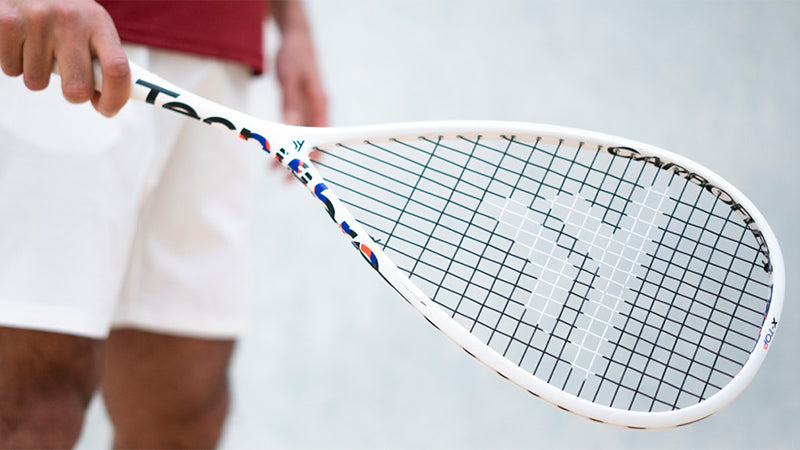 Image of a squash player holding a Tecnifibre Carboflex X-Top racquet