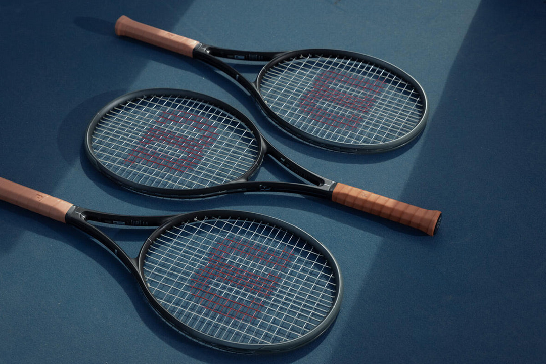 an image showing three Wilson RF 01 tennis racquets designed in collaboration with tennis legend Roger Federer.